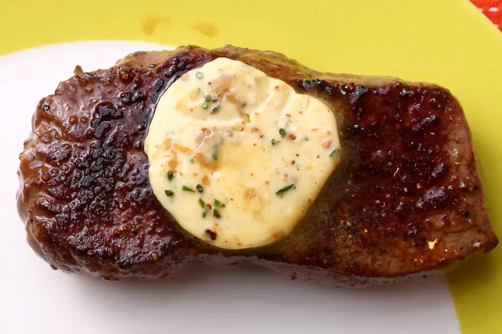 why do chefs put butter on steak